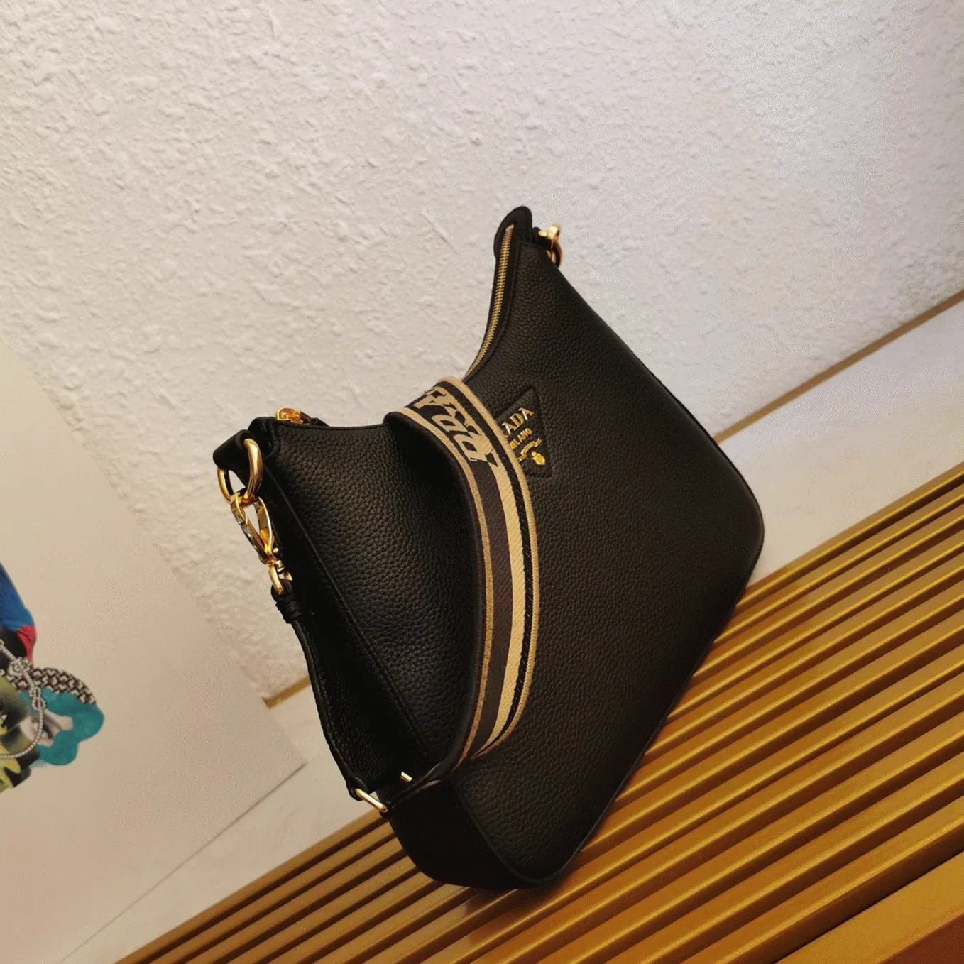 Reference image illustrating Replica Prada Re-Edition 2005 Shoulder Bag in Black Saffiano Leather