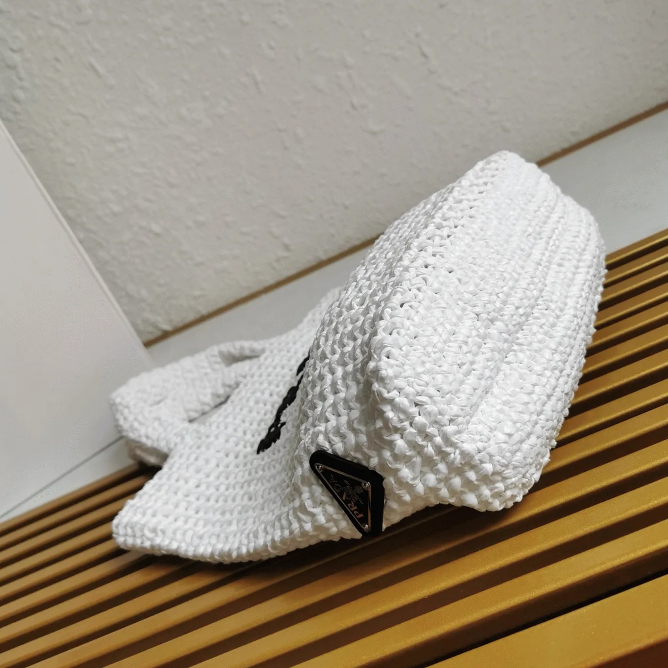 Reference image illustrating Replica Prada Crochet Tote Bag in White Raffia-Effect Yarn – A Detailed Style Guide