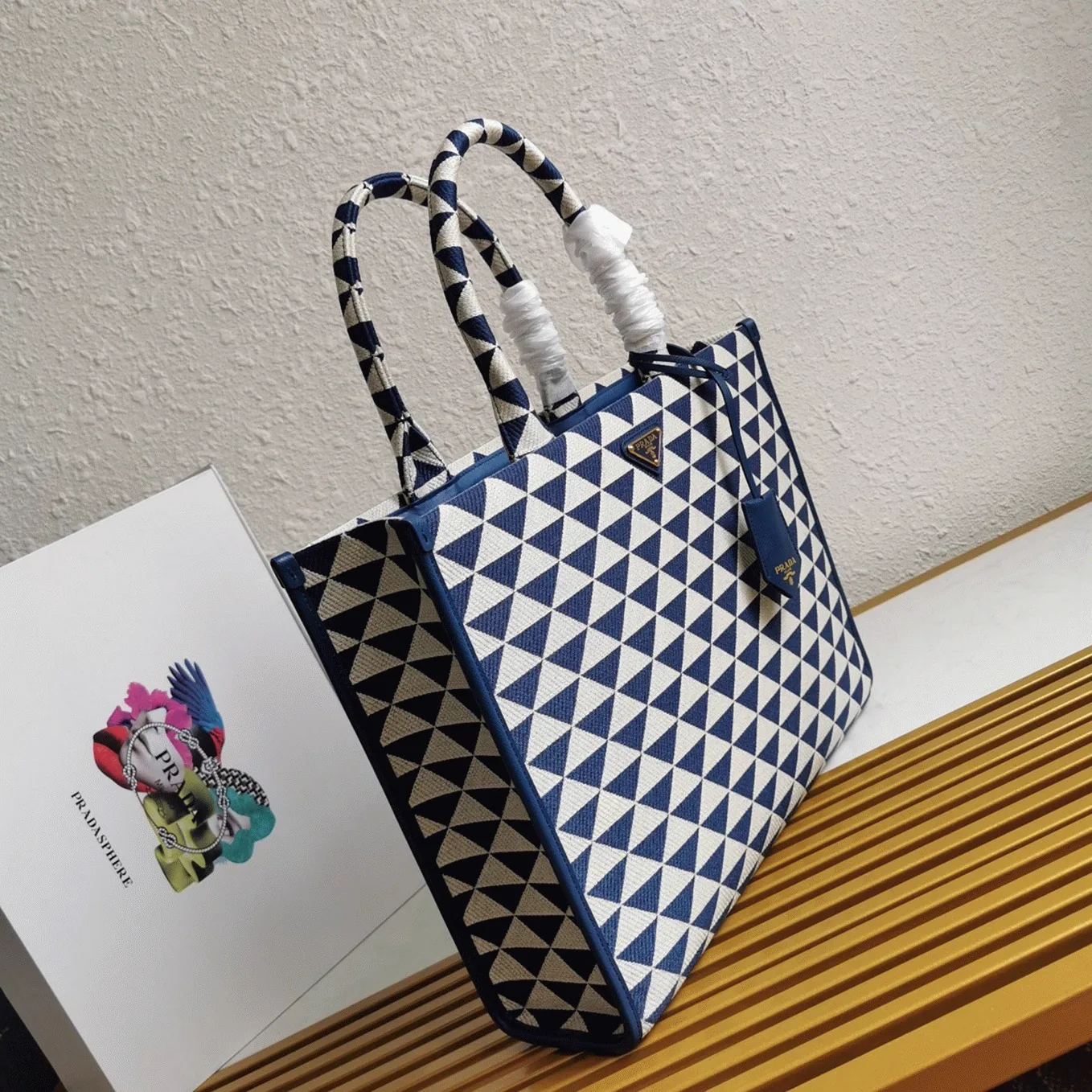 Reference image illustrating Replica Prada Symbole Large Bag in White/Blue Jacquard Fabric – A Detailed Style Guide
