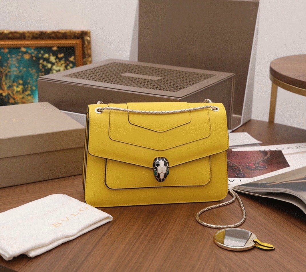 Reference image illustrating Replica Bvlgari Serpenti Forever Medium Shoulder Bag in Yellow Calfskin – Design, History & Styling Guide