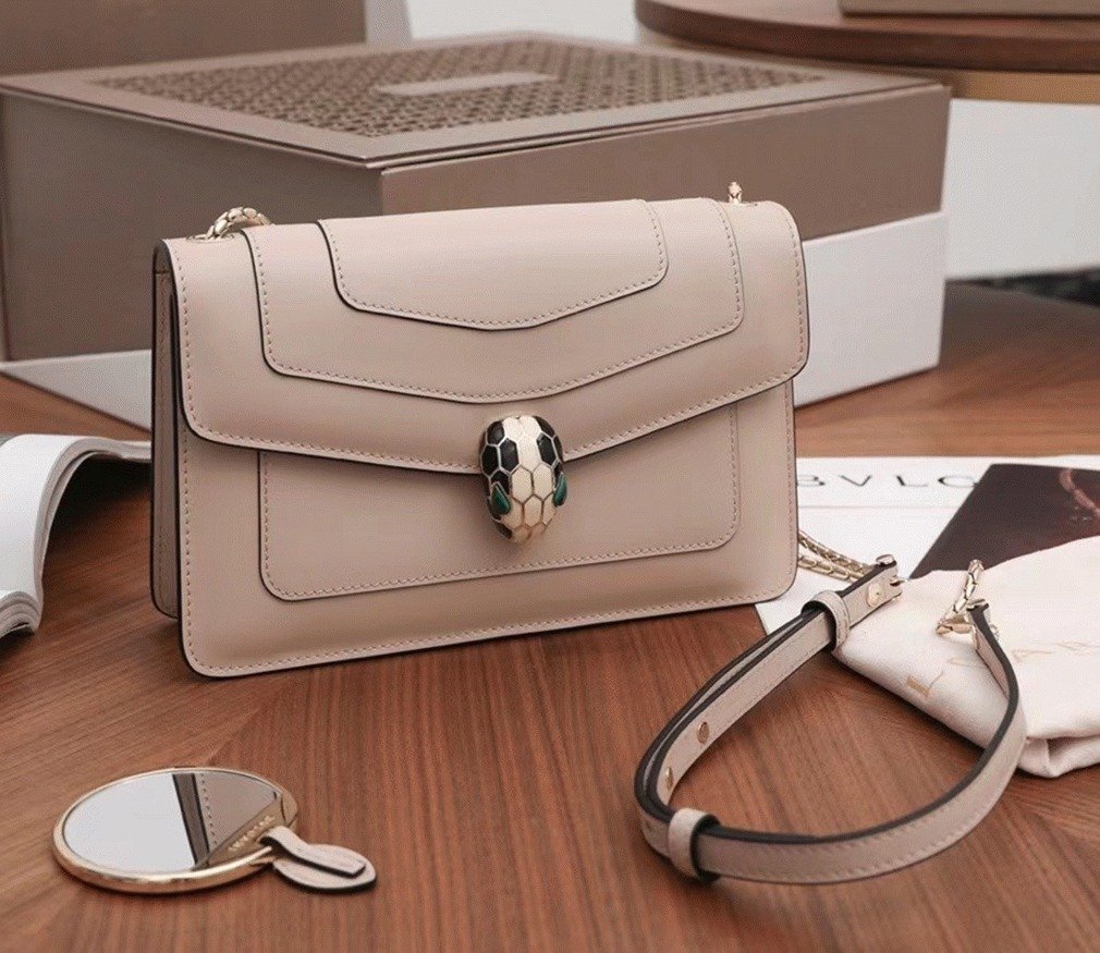 Reference image illustrating Replica Bvlgari Serpenti Forever Small Cross-body Bag in Beige Calfskin