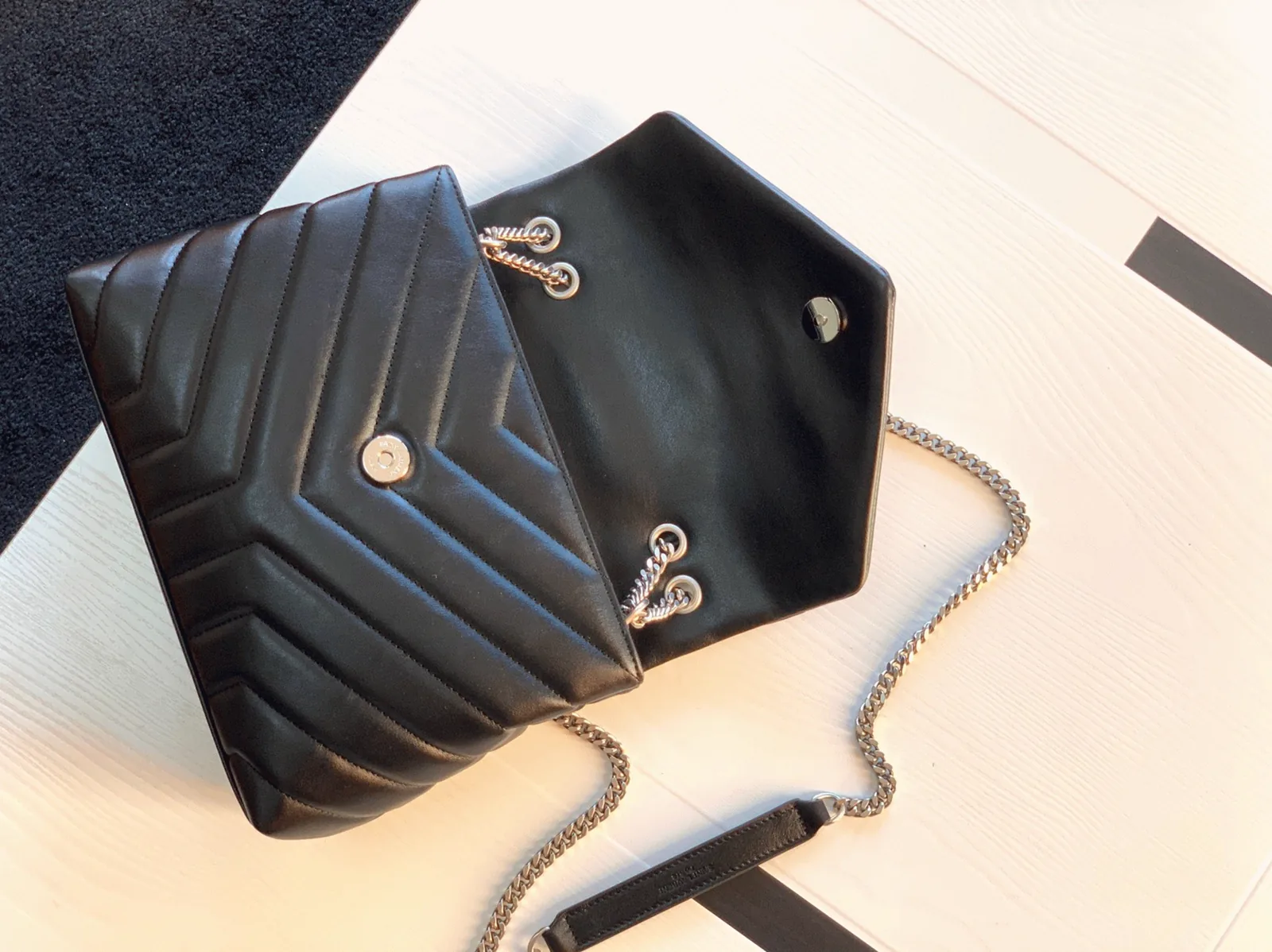 Reference image illustrating Replica Saint Laurent LouLou Small Chain Bag in Noir – A Detailed Style Guide