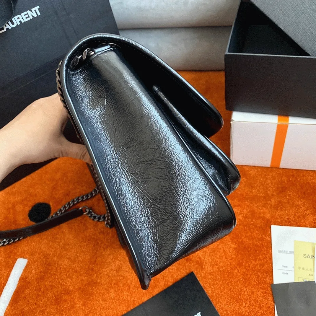 Reference image illustrating Replica Saint Laurent Niki Medium Chain Bag Black – Detailed Style Guide