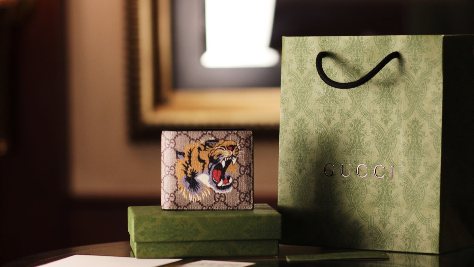 Replica Gucci Tiger Print GG Supreme Wallet – Iconic Animalier Design cover image
