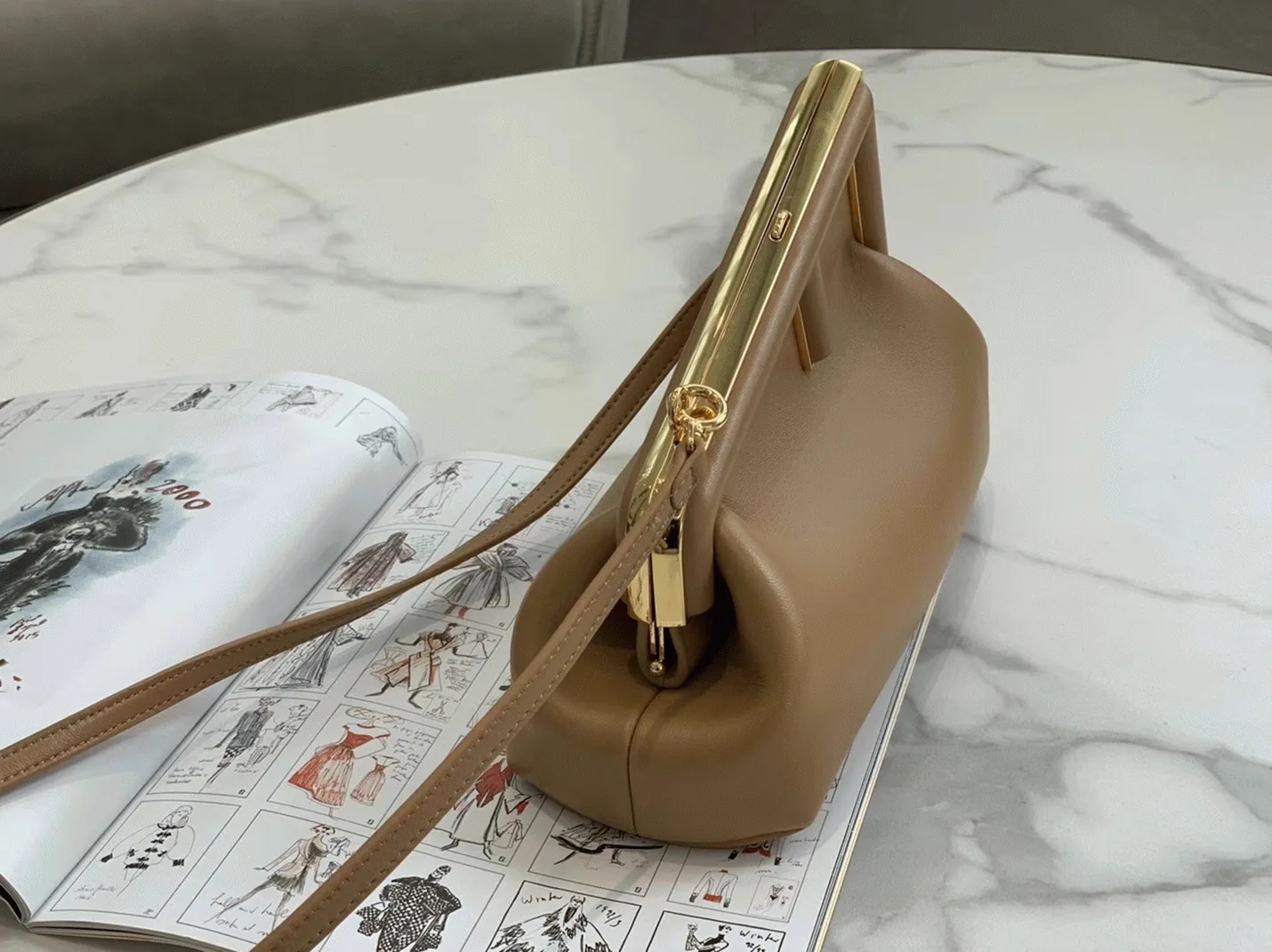 Reference image illustrating Replica Fendi First Small Bag in Light Brown: Design, History, and Styling Guide