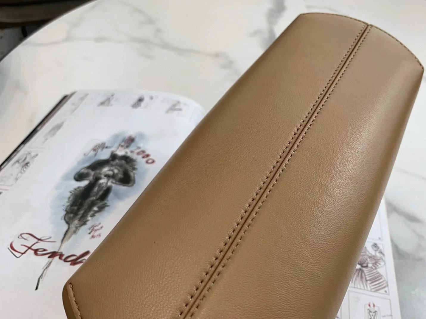 Reference image illustrating Replica Fendi First Small Bag in Light Brown: Design, History, and Styling Guide