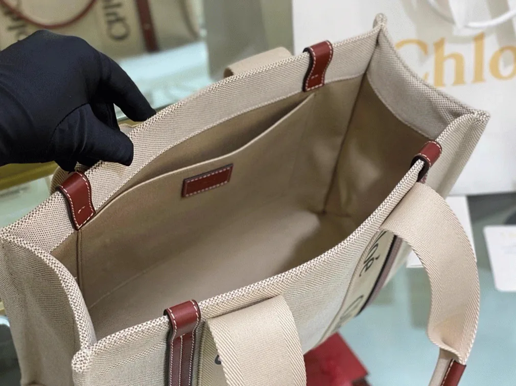 Reference image illustrating Replica Chloe Medium Woody Tote Bag in Canvas with Brown Leather Strips