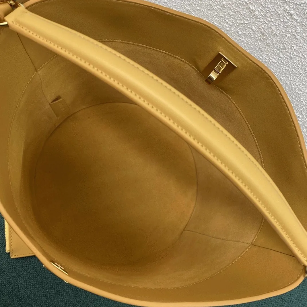 Reference image illustrating Replica Celine Bucket 16 Bag in Yellow Soft Bare Calfskin – A Detailed Style Guide