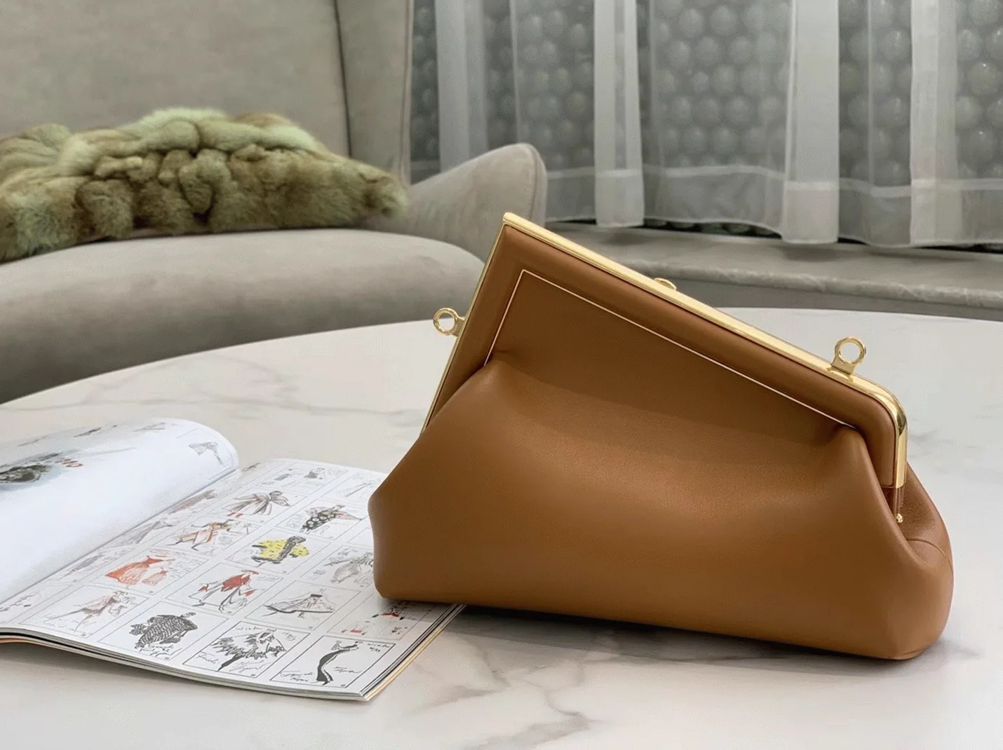 Reference image illustrating Replica Fendi First Small Bag in Brown – Design, History & Styling Guide