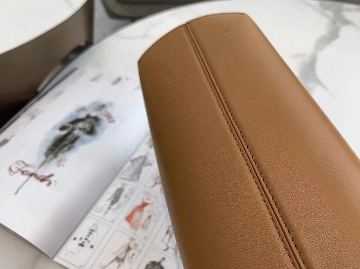 Reference image illustrating Replica Fendi First Small Bag in Brown – Design, History & Styling Guide