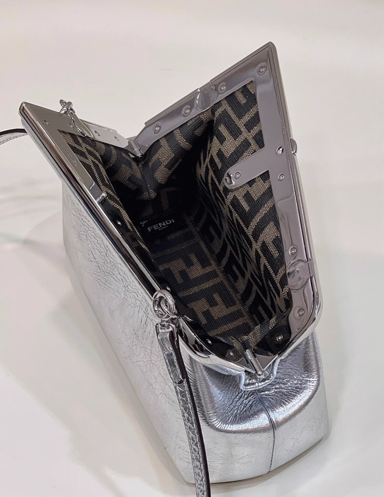 Reference image illustrating Replica Fendi First Small Bag in Silver: Design, History & Styling Guide