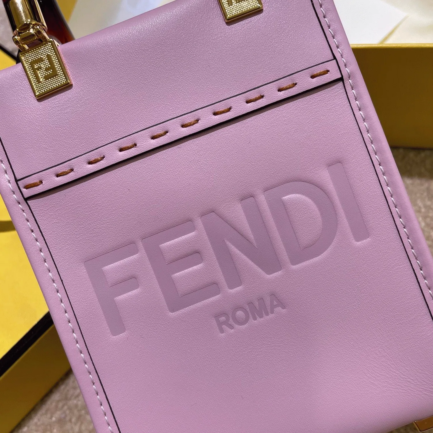 Reference image illustrating Replica Fendi Mini Sunshine Shopper Bag in Lilas Leather – Style & Design Guide