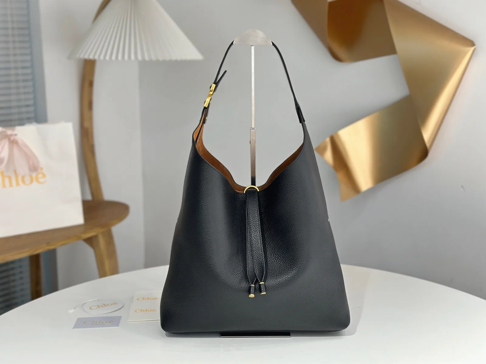 Reference image illustrating Replica Chloé Marcie Hobo Bag in Black Grained Leather – Design, History & Styling Guide