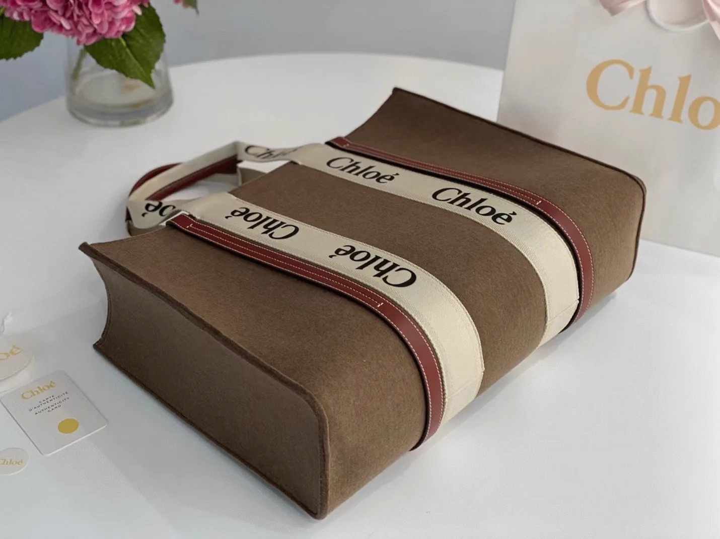 Reference image illustrating Replica Chloé Medium Woody Tote Bag in Brown Felt – A Detailed Style Guide