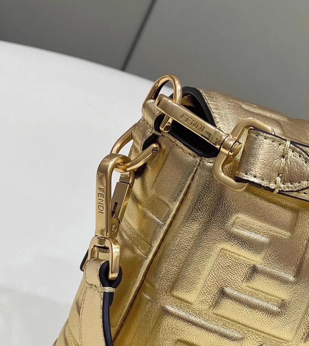 Reference image illustrating Replica Fendi Large Baguette Bag in Gold FF – A Detailed Style Guide