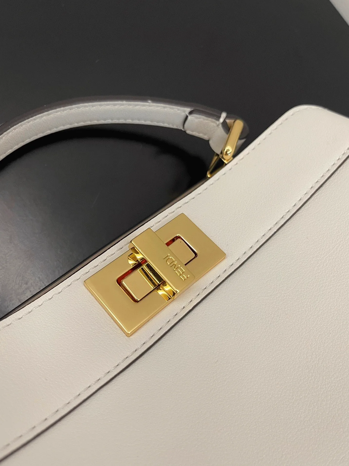 Reference image illustrating Replica Fendi Peekaboo ISeeU Small Bag in White Calfskin – Design, History & Styling Guide