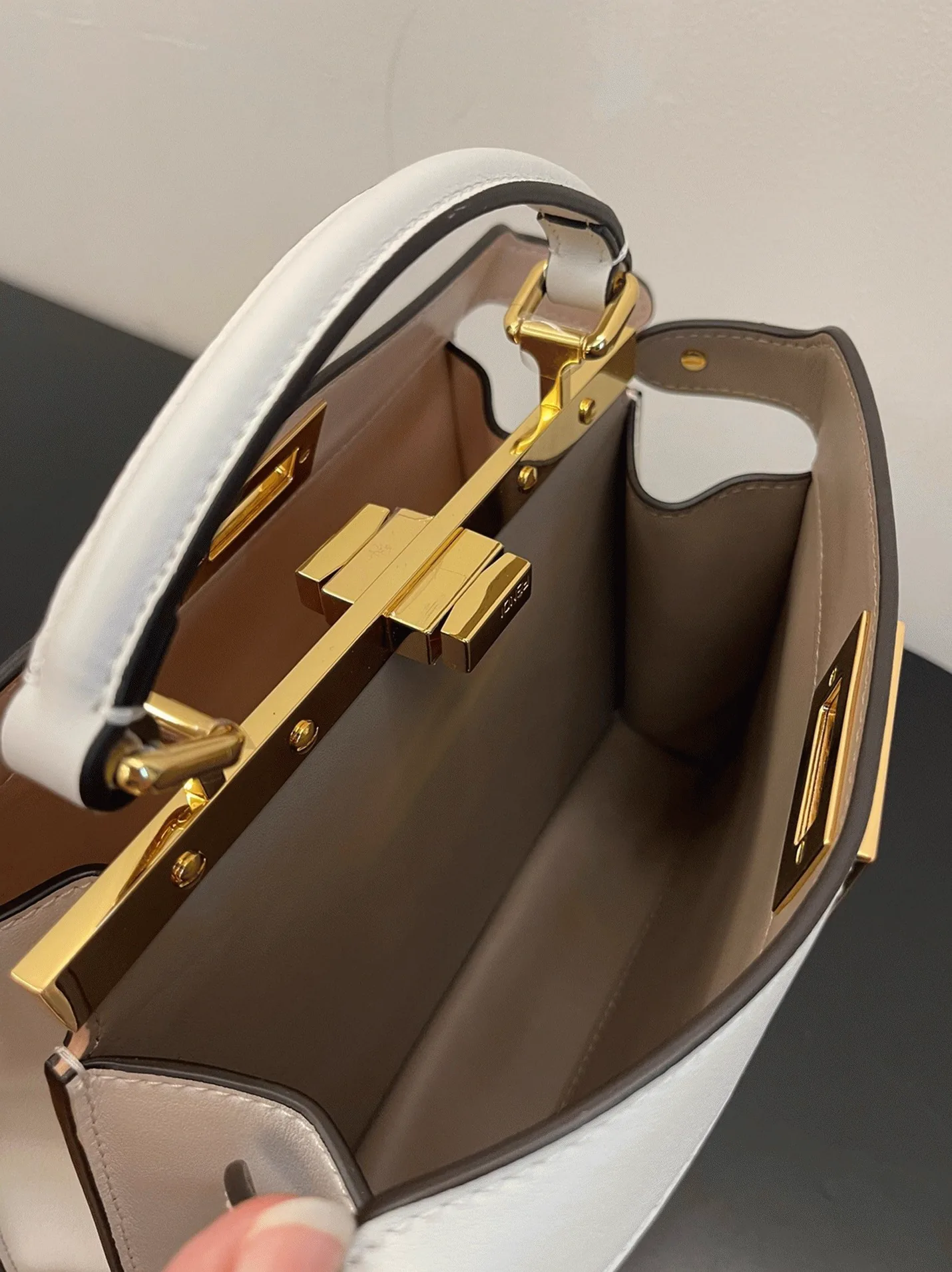 Reference image illustrating Replica Fendi Peekaboo ISeeU Small Bag in White Calfskin – Design, History & Styling Guide
