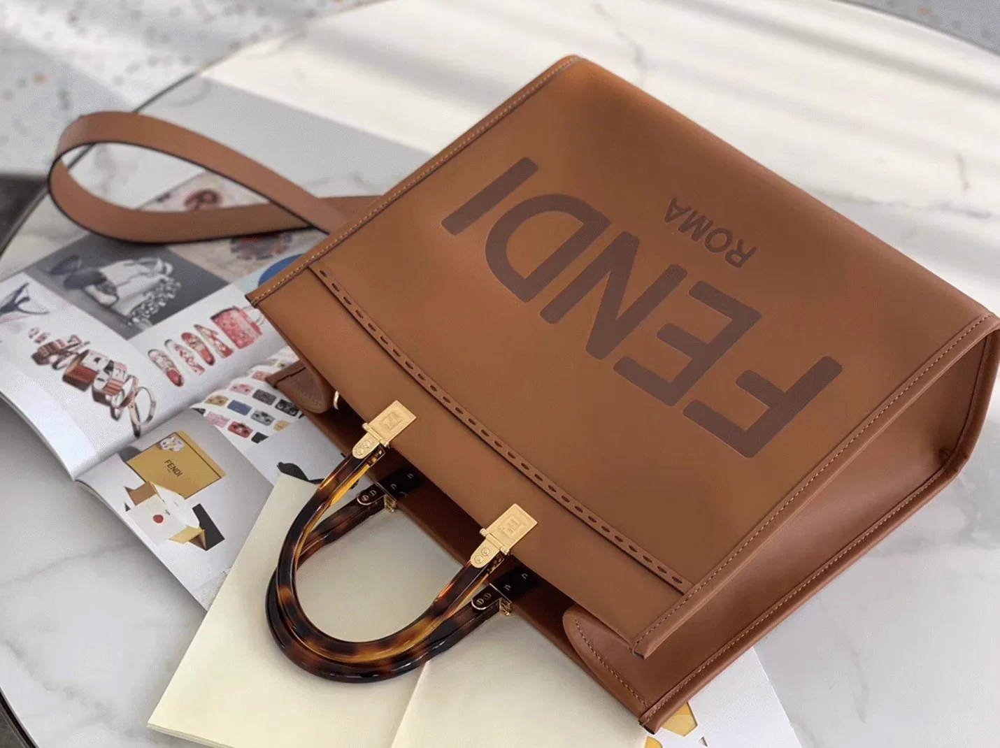 Reference image illustrating Replica Fendi Sunshine Medium Tote Bag in Brown Calfskin – A Detailed Style Guide