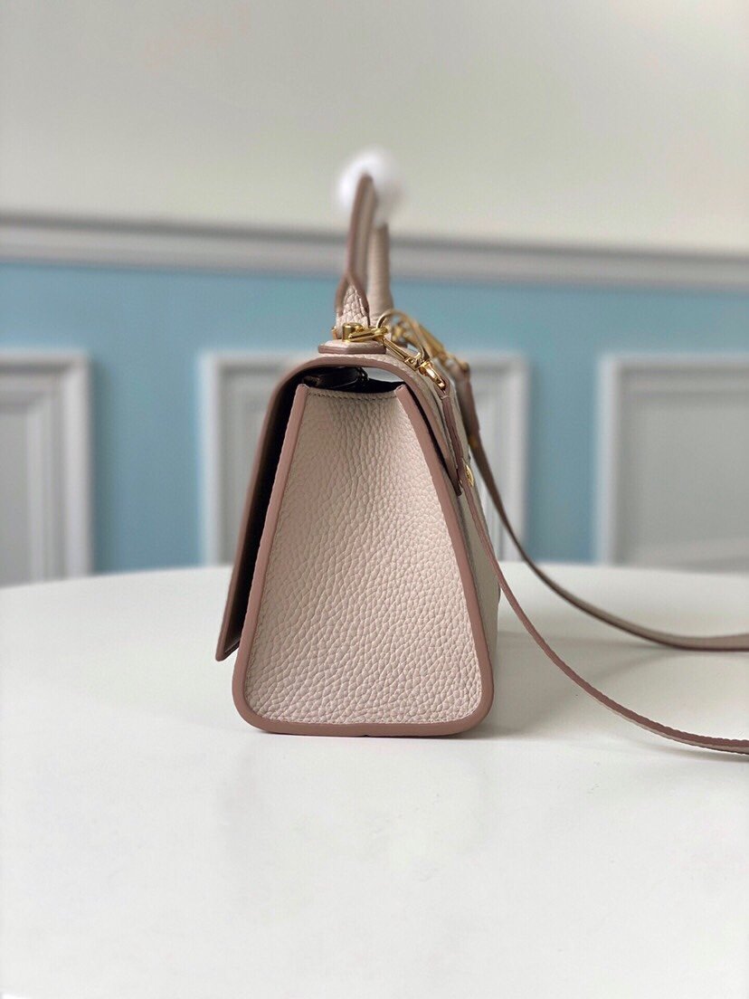 Reference image illustrating Replica Louis Vuitton Twist MM Handbag (Model M57136) – Detailed Style Guide