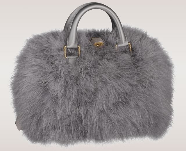 Reference image illustrating 5 Dream Handbags to Celebrate National Handbag Day: From Chanel Alligator to Tiffany Lunchbox