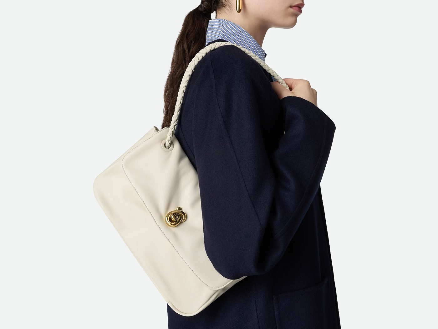 Reference image illustrating 6 Stunning White Handbags to Carry This Summer 2026