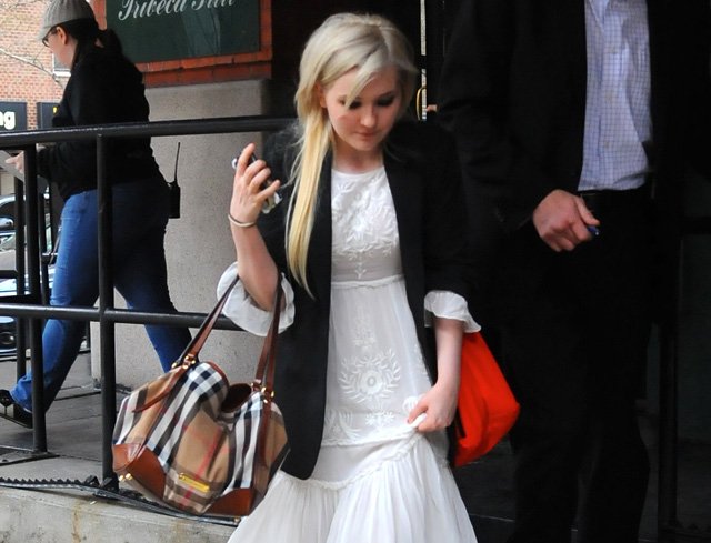 Reference image illustrating Abigail Breslin’s Burberry Canterbury Shoulder Bag: A Grown-Up Street Style Moment in NYC