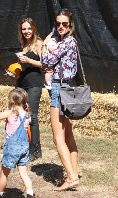 Reference image illustrating Alessandra Ambrosio’s Givenchy Pandora Satchel Steals the Show at a Pumpkin Patch