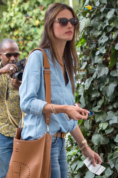 Reference image illustrating Alessandra Ambrosio Spotted with Hermès Evelyne Bag While Shopping at Chanel in Beverly Hills