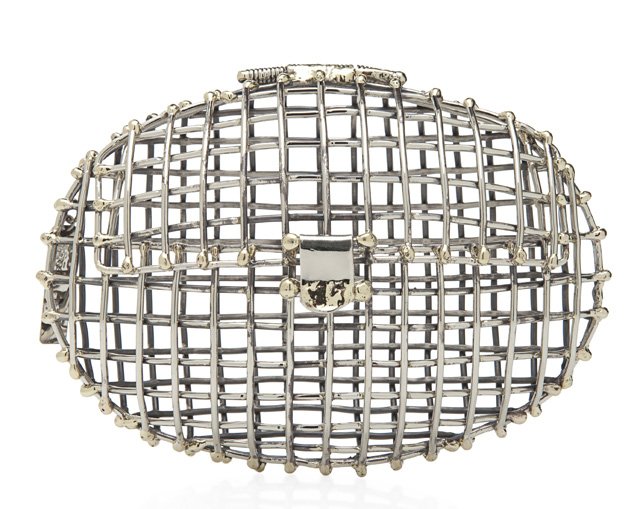 Reference image illustrating Anndra Neen Returns: Sculptural Metal Clutches That Blend Grunge and Glamour