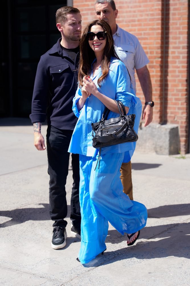Reference image illustrating Anne Hathaway’s Off-Duty Look Puts the Balenciaga Le City Bag Back in the Spotlight