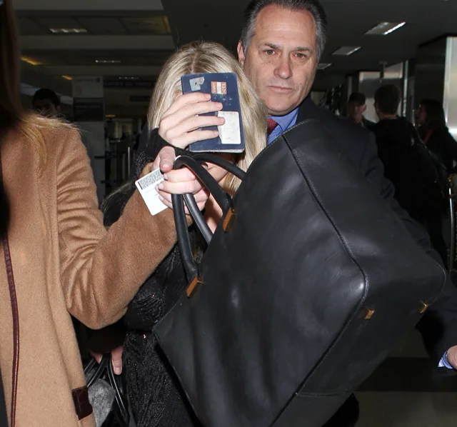 Reference image illustrating Ashley Olsen Uses The Row Day Luxe Tote as a Carry-On and Paparazzi Shield