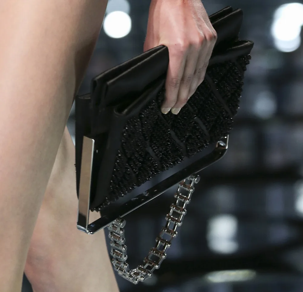 Reference image illustrating Balenciaga Spring 2015 Handbags: Alexander Wang's Refined Exotic Clutches and Top-Handle Designs