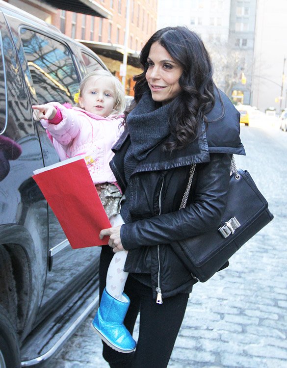 Reference image illustrating Bethenny Frankel Spotted with Christian Louboutin Sweet Charity Bag During School Pick-Up