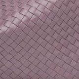 Reference image illustrating Bottega Veneta Fall/Winter 2009 Handbag Collection: Intricate Leather Craftsmanship and Seasonal Colors