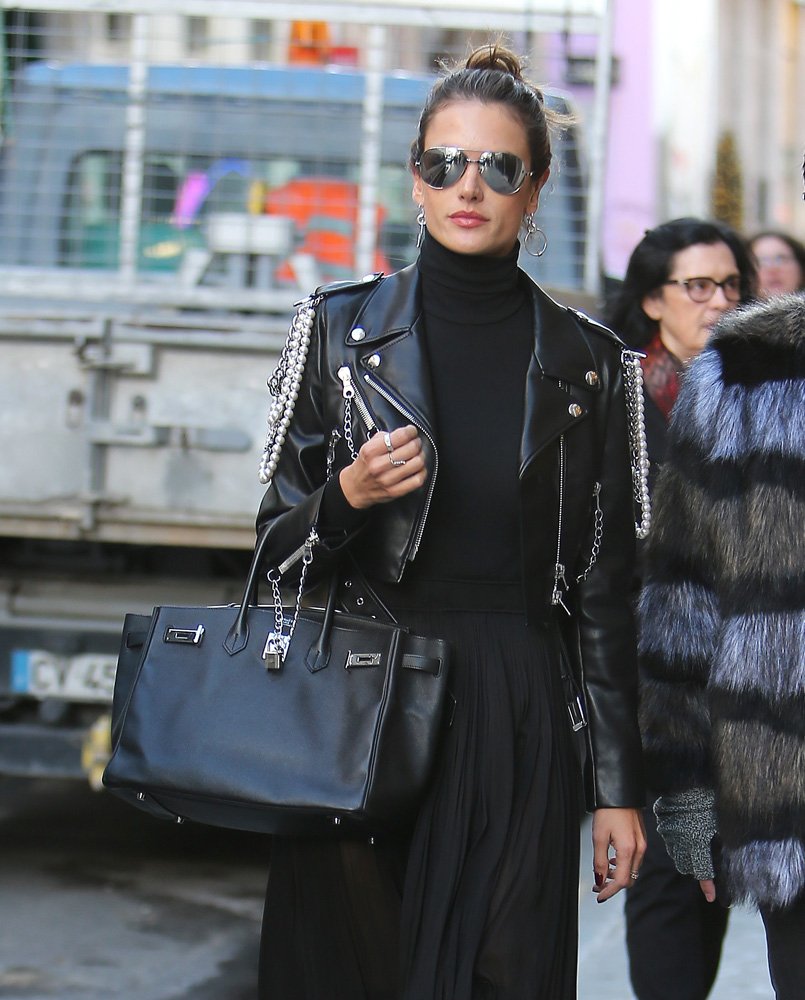 Reference image illustrating Celebrities in Paris, LA, and NYC Carry Oversized Black Bags from Hermès, Aerin, and Stella McCartney