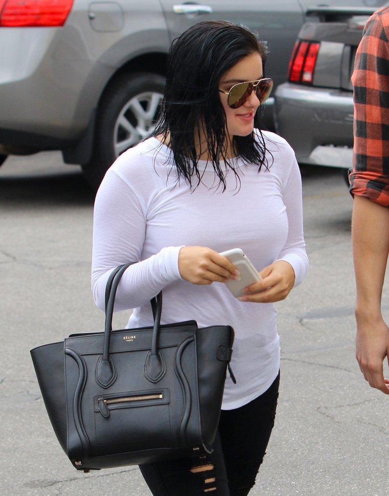 Reference image illustrating Celebrities in Paris, LA, and NYC Carry Oversized Black Bags from Hermès, Aerin, and Stella McCartney