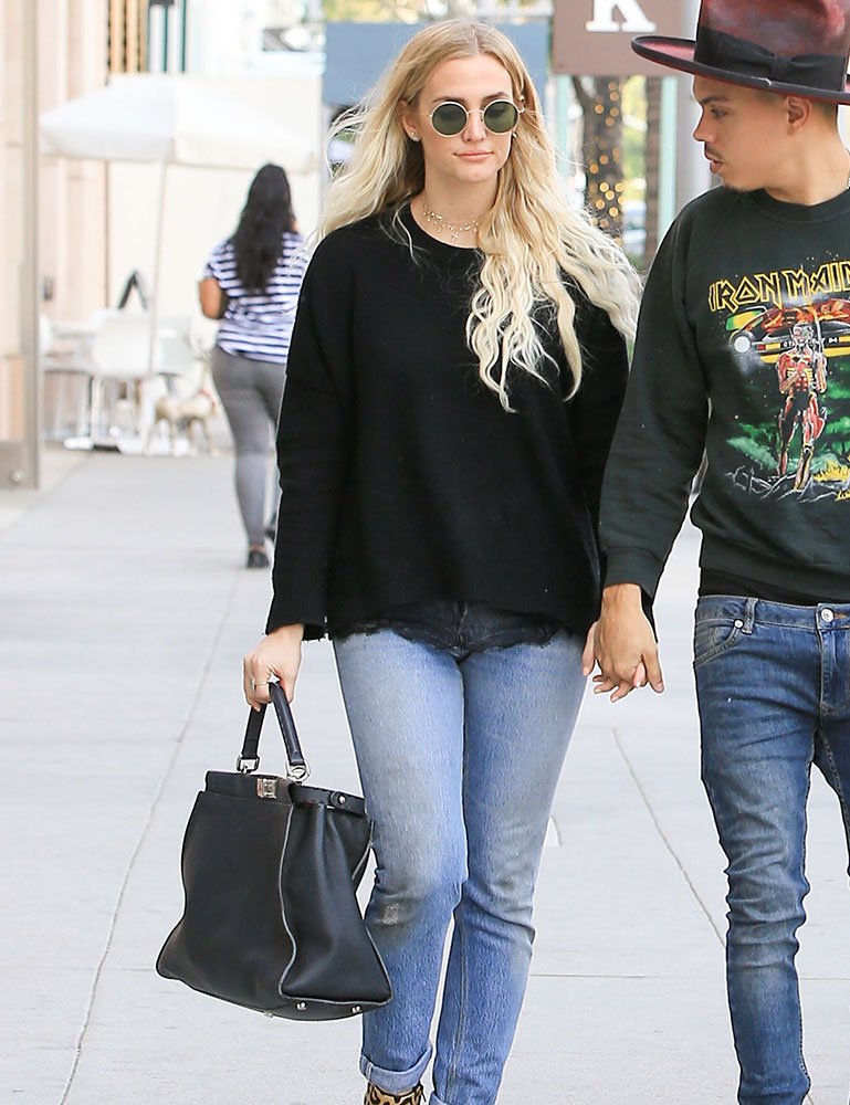 Reference image illustrating Celebrities Spotted Holiday Shopping with Givenchy, Louis Vuitton, and Chanel Bags