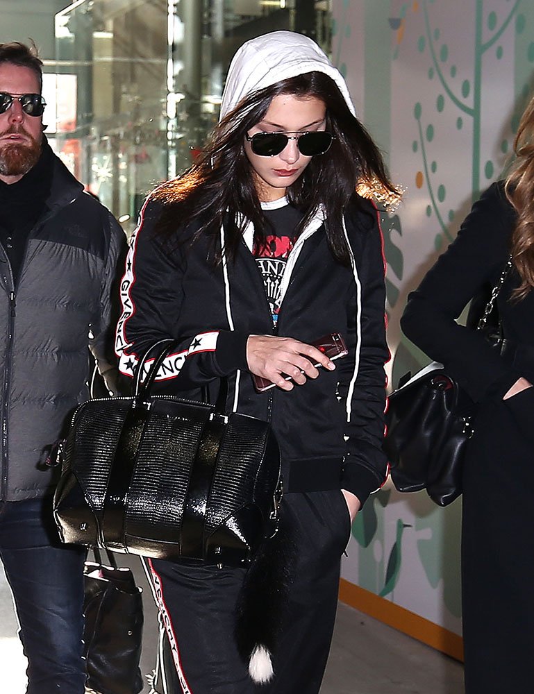 Reference image illustrating Celebrities Spotted Holiday Shopping with Givenchy, Louis Vuitton, and Chanel Bags