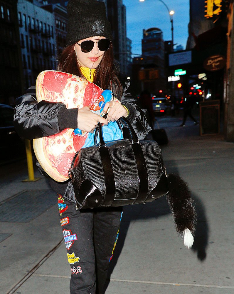 Reference image illustrating Celebrities Spotted with Louis Vuitton, Proenza Schouler & More Designer Bags During Holiday Season