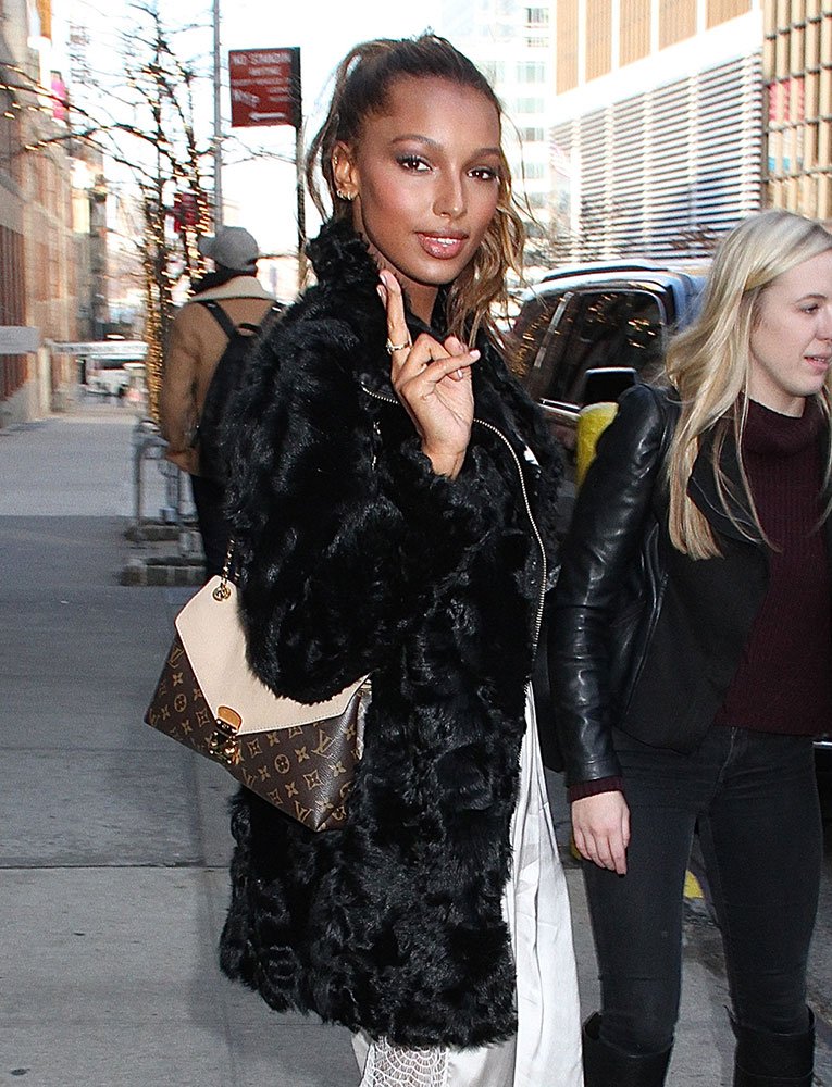 Reference image illustrating Celebrities Spotted with Louis Vuitton, Proenza Schouler & More Designer Bags During Holiday Season