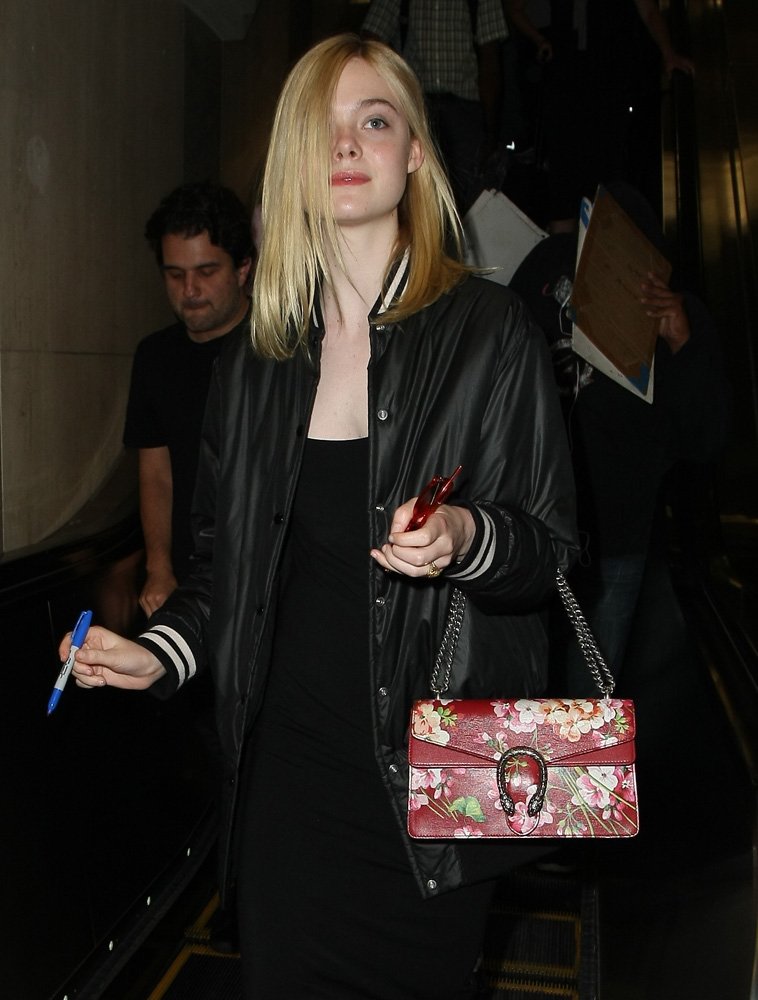 Reference image illustrating Celebrity Red Handbag Obsession: The Hottest Designer Bags Spotted This Week