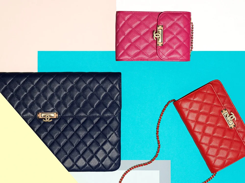 Reference image illustrating Chanel Fall 2016 Small Leather Goods: WOCs, Wallets & Tweed Phone Cases