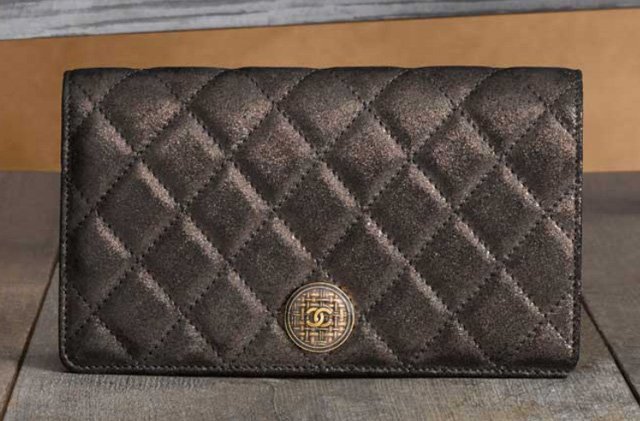 Reference image illustrating Chanel Métiers d'Art 2013 Small Leather Goods: Scottish-Inspired Wallets and Accessories