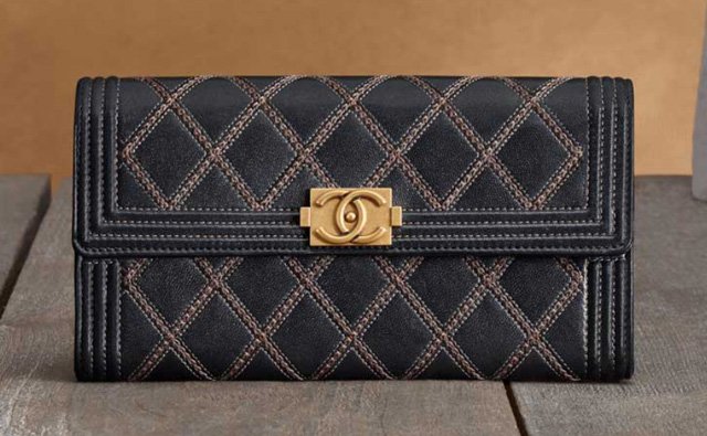 Reference image illustrating Chanel Métiers d'Art 2013 Small Leather Goods: Scottish-Inspired Wallets and Accessories