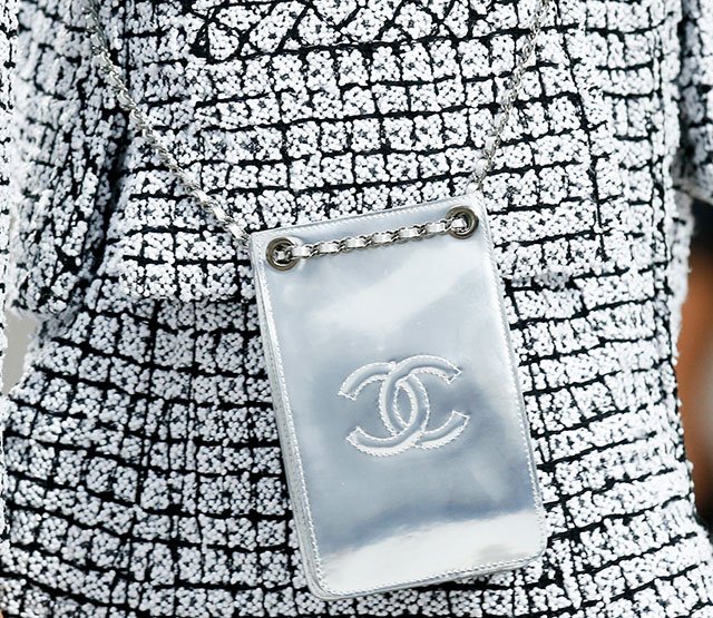 Reference image illustrating Chanel Spring 2014 Handbags: Artistic Graffiti Backpacks and Oversized Portfolios Steal the Runway