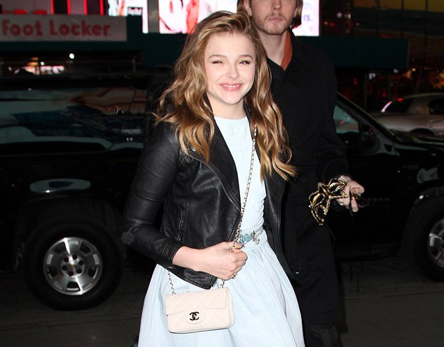 Reference image illustrating Chloë Grace Moretz’s Sweet 16 Look: A Cream Chanel Mini Classic Flap Bag Steals the Spotlight