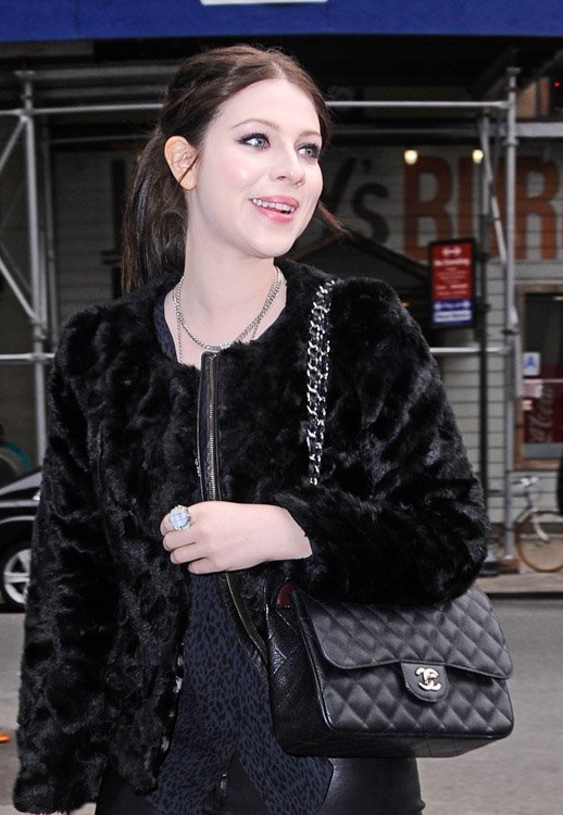 Reference image illustrating Courtside Couture: The Most Coveted Celebrity Handbags Spotted at NBA Games