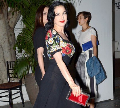Dita Von Teese’s Charlotte Olympia Pandora Perspex Box Clutch: A Retro Fairytale Moment at Chateau Marmont cover image