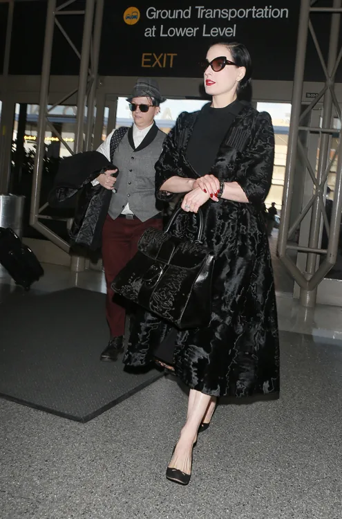 Reference image illustrating Dita Von Teese Spotted at LAX with a Rare Delvaux Astrakhan Brillant GM Bag