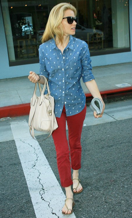 Reference image illustrating Elizabeth Banks Spotted with Tod’s D-Styling Bag During Casual Salon Visit in Beverly Hills